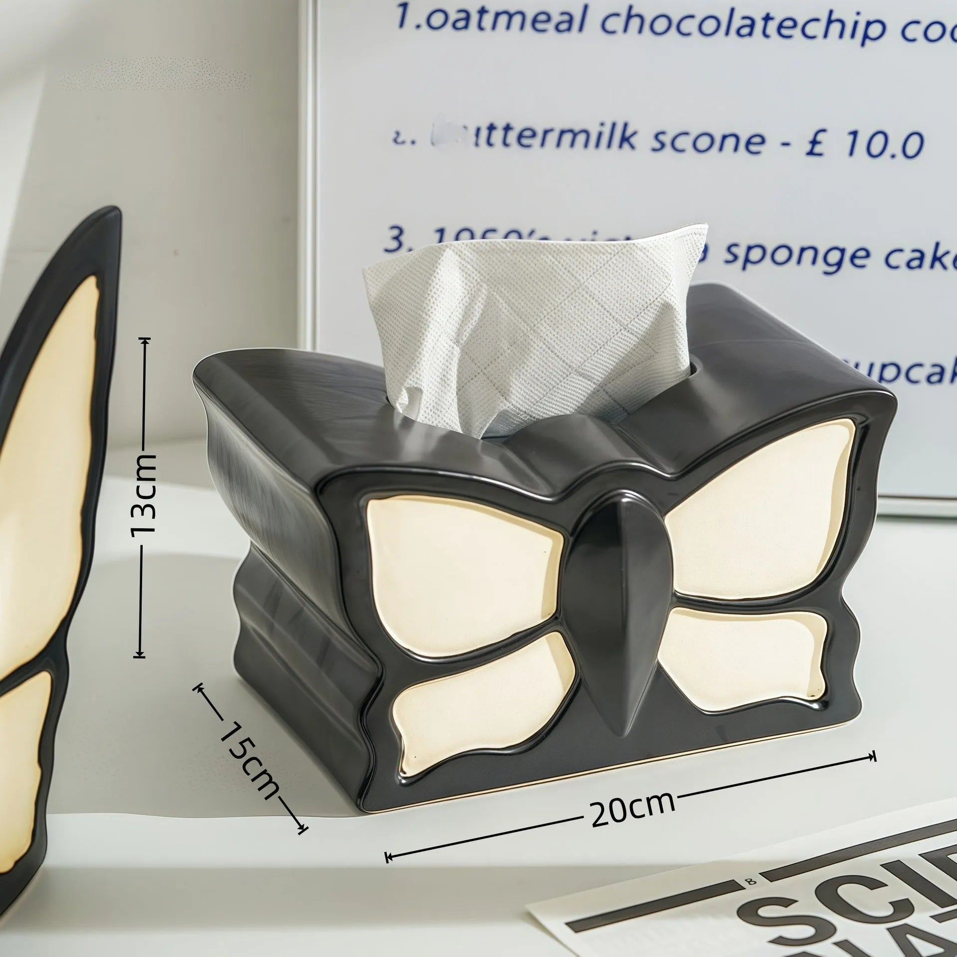Ceramic light luxury butterfly tissue box and vase set on a living room side table