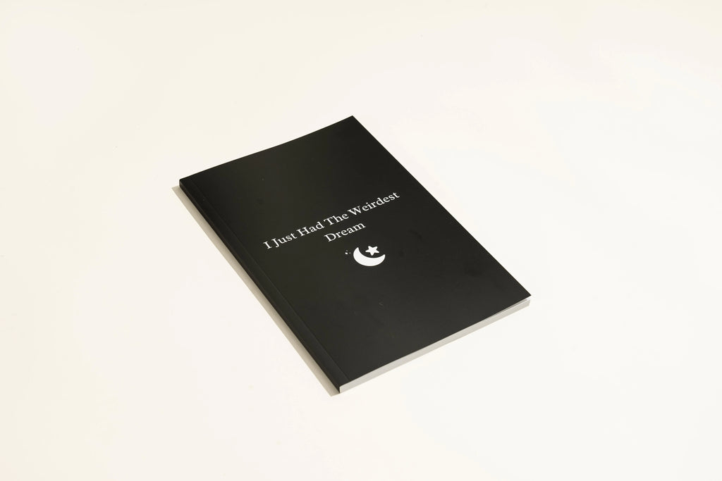 Black hardback A5 dream journal notebook with business simplicity style and ruled interior pages