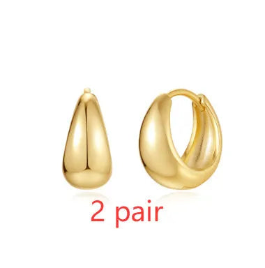 Gold electroplated brass diamond earclip earrings with geometric round design on copper base