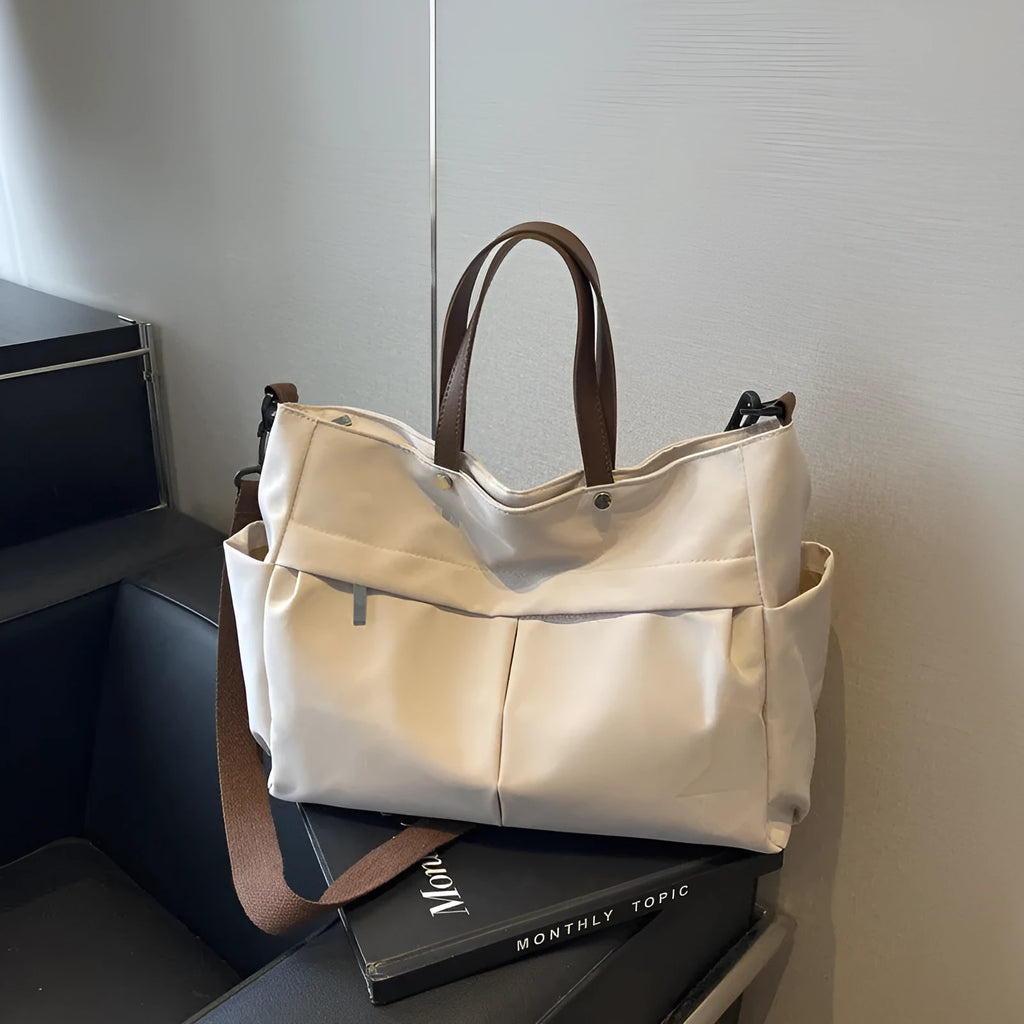 Nylon crossbody tote bag in milky white with short shoulder strap and flat base