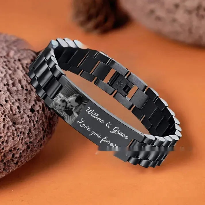 Titanium steel bracelet with curved heart shape and engraved commemorative lettering