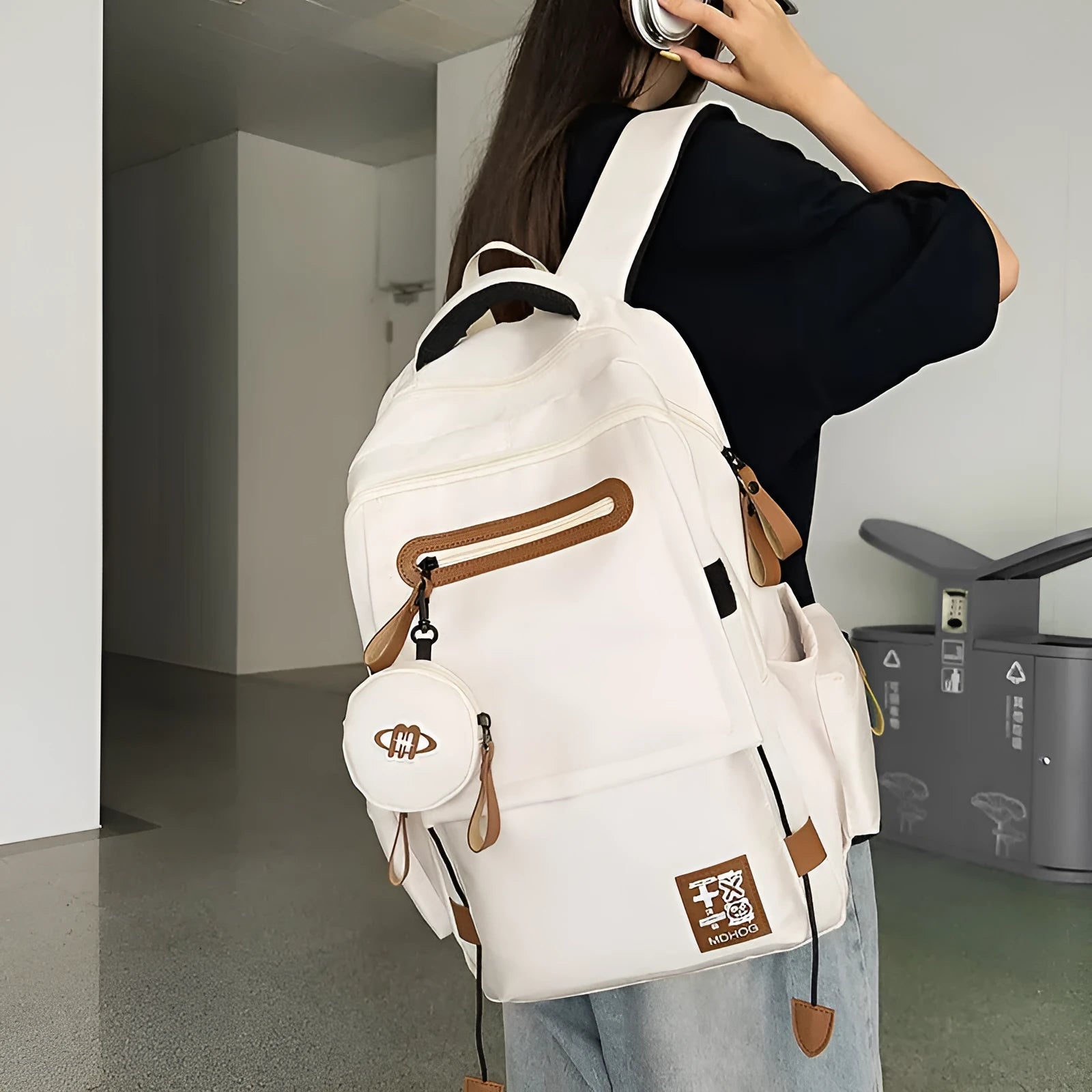 Japanese large capacity leisure travel backpack in black nylon with contrast stitching and waterproof finish