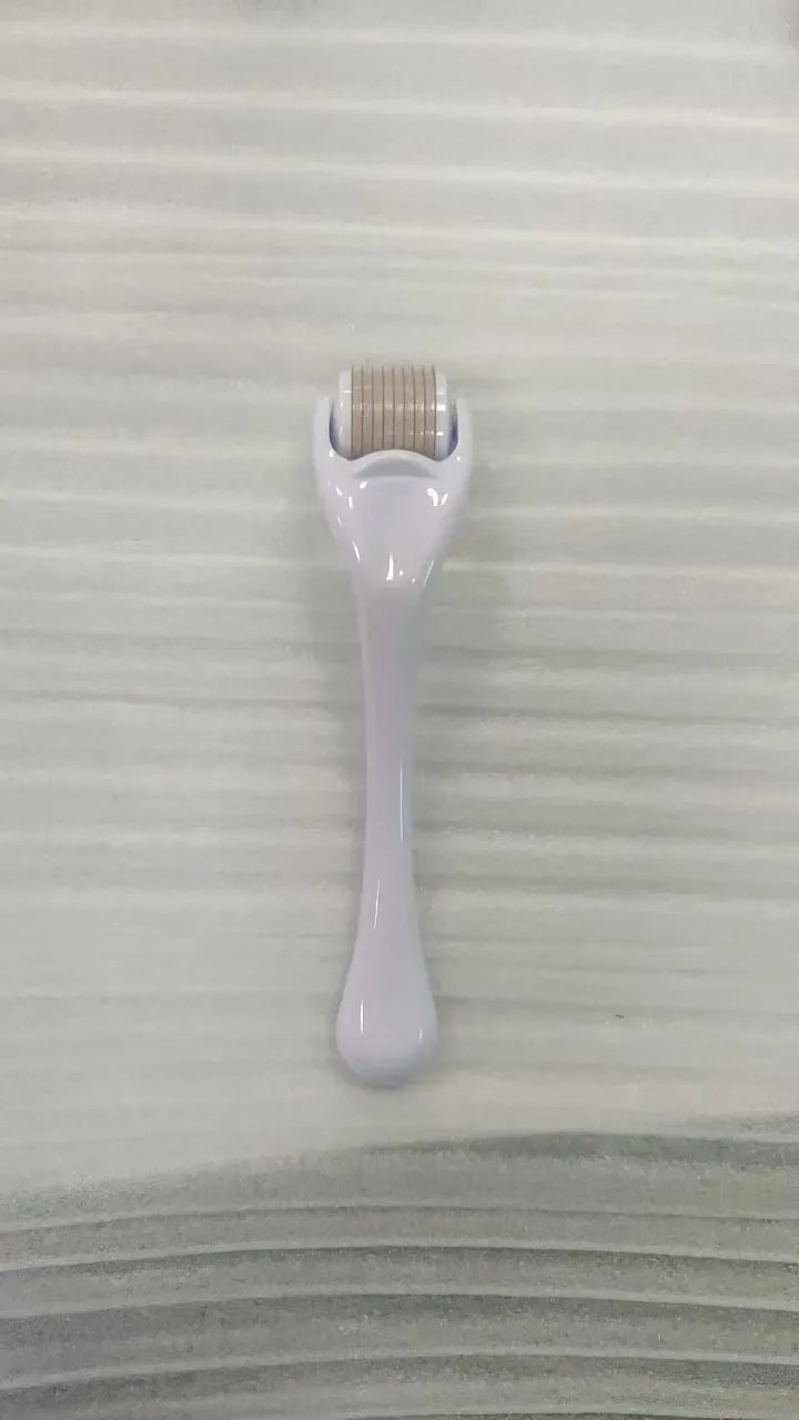 540 needle derma roller with black handle and coloured wheel, showing 0.25mm 0.3mm size options for micro-needling.