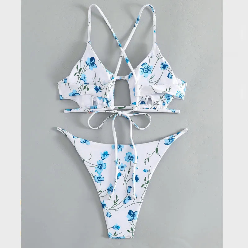 Women's floral tie-neck triangle swimsuit set with polyester lining and matching shorts in multiple colours sizes XS to XL.