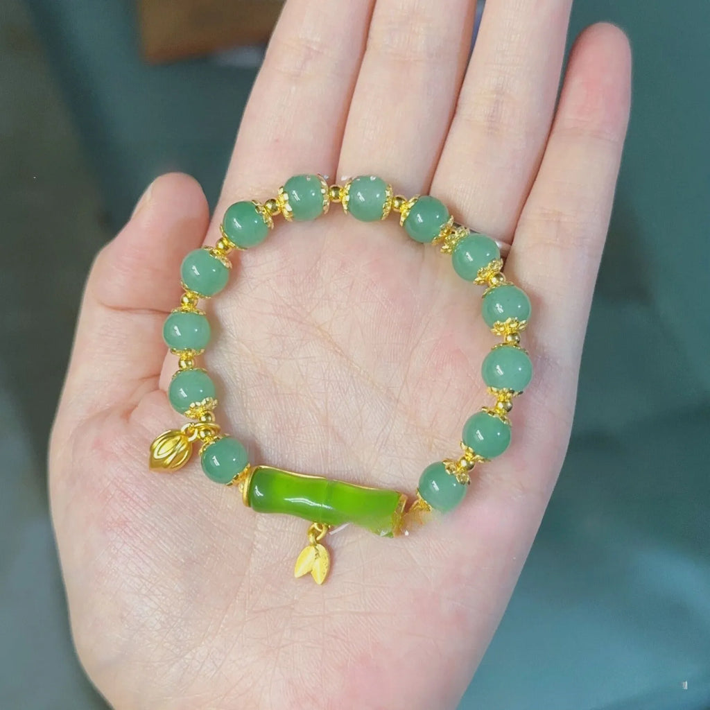 Bamboo special-design glass bracelet in beige with flower shape and Ruyi element, electroplated finish