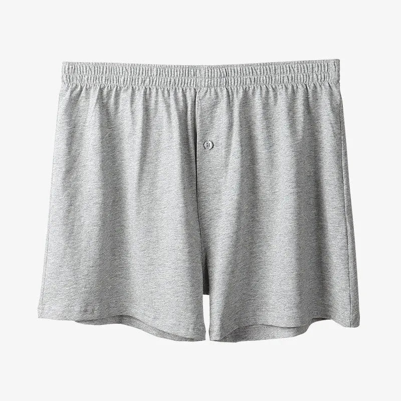 Men's light grey cotton boxer shorts with high waist and loose fitting design