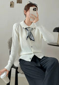 Beige acrylic knit cardigan with lapel scarf collar design, long sleeves and cardigan styling