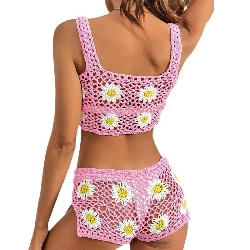 Light green floral pattern women's bikini swimsuit top and pants set on a mannequin.