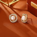 Natural pearl winding ear studs with real gold plating on copper base, geometric round shape, 1 cm diameter