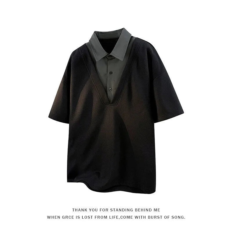 Men's black heavy Henry collar short sleeve polo shirt sweater with padding on a hanger.