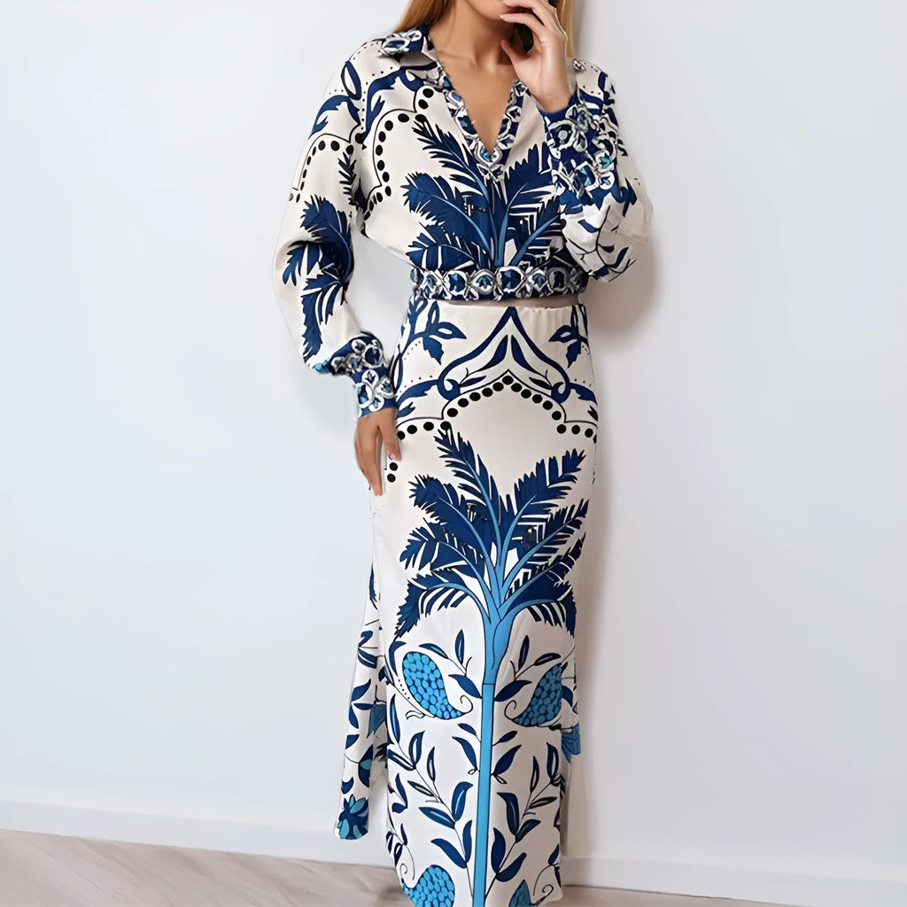 Women's floral print polyester co-ord set with long sleeves and a long skirt on a hanger.