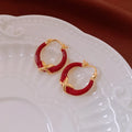 Real gold plating red enamel earrings for women copper geometric ear clip letter motif