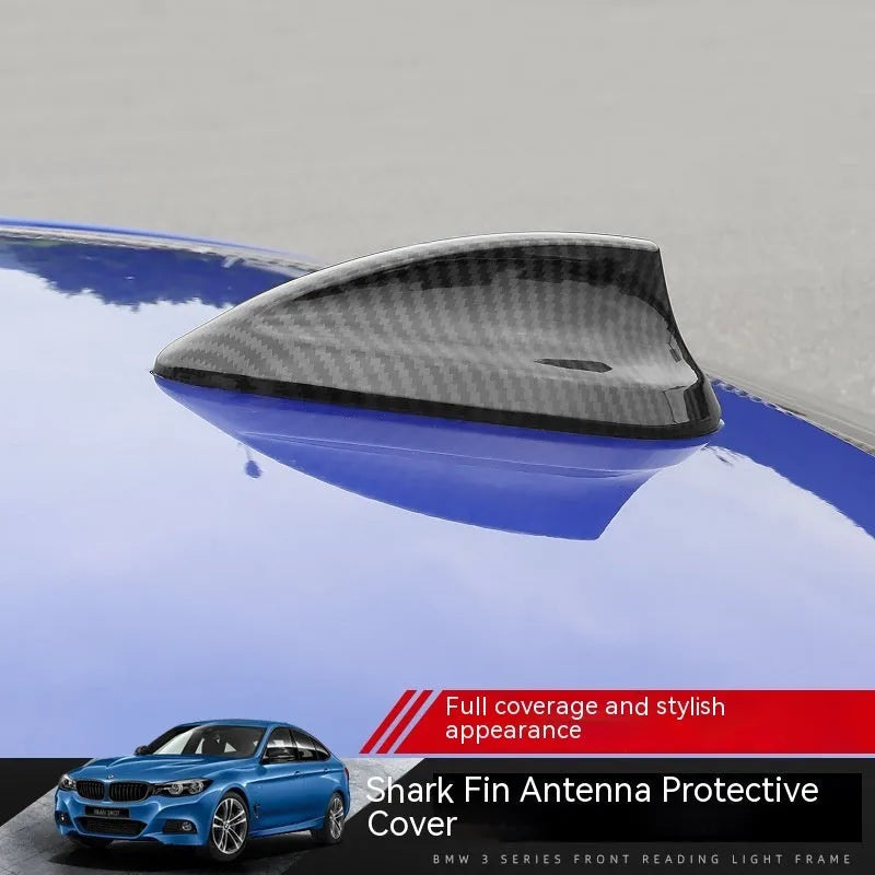 BMW shark fin antenna cover in carbon fibre drill pattern finish on a car roof