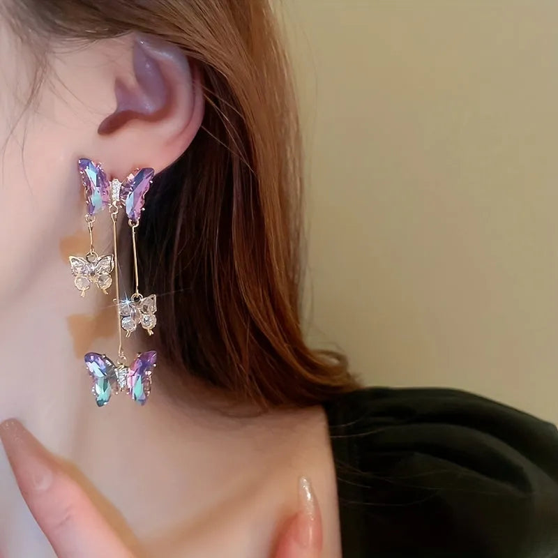 Blue purple butterfly tassel drop earrings with silver needle crystal flowers for women.