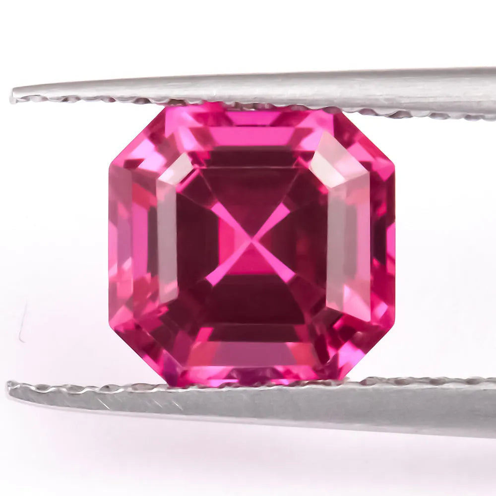 Cultured ruby gemstone loose stone in a selection of cuts including round, princess, and water drop.