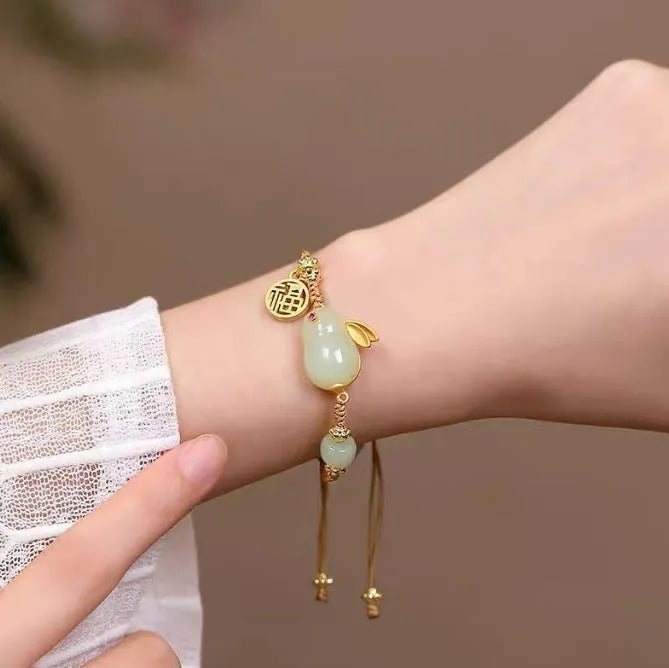 Natural Hetian jade rabbit bracelet with yellow string cord for women