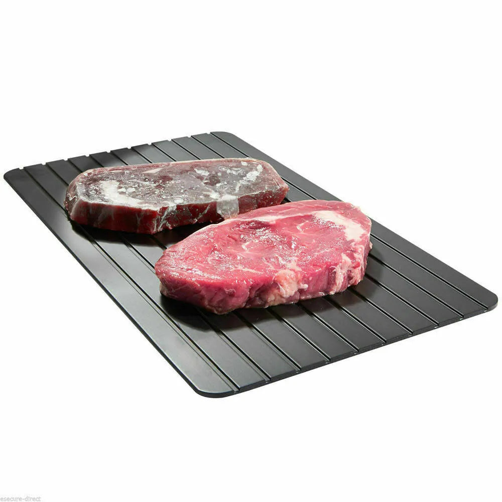 Black aluminium fast defrost tray 23x16.5cm on a countertop