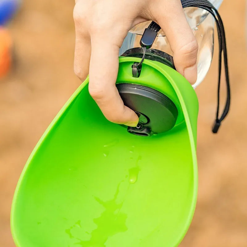 Portable dog water bottle with drinking bowl in sky blue colour showing 680ml capacity and key lock