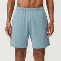 Men's quick-dry double-layer running shorts in multiple colours on a size chart.