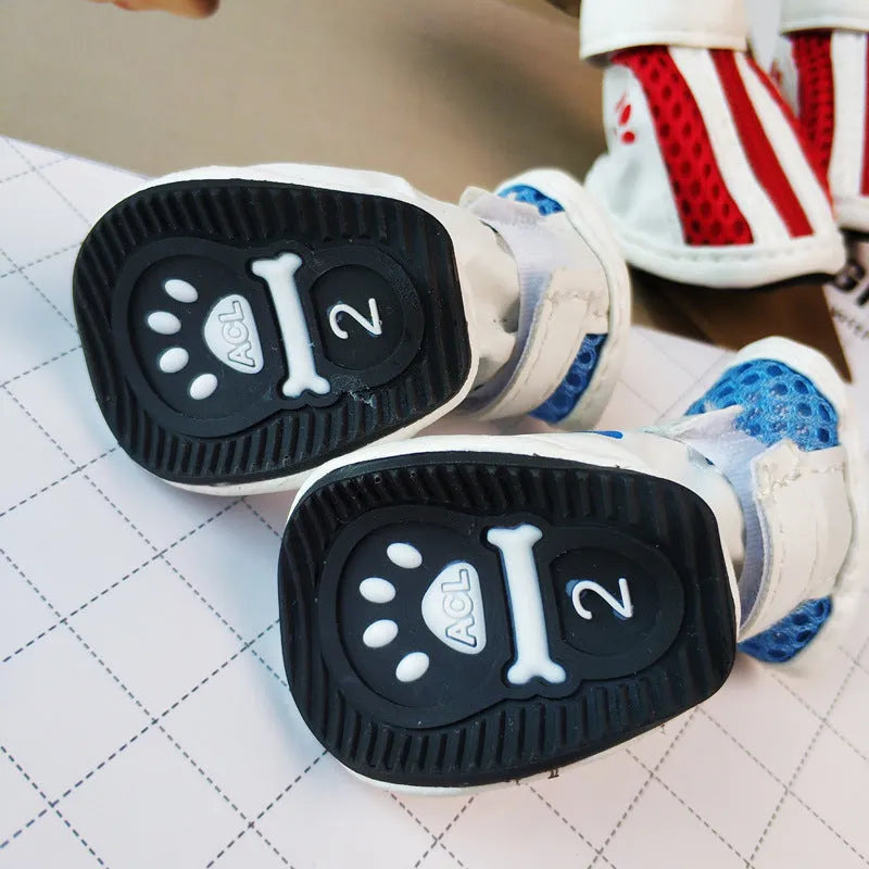 Blue zipper dog shoes for small pets showing non-slip sole and fleece lining.