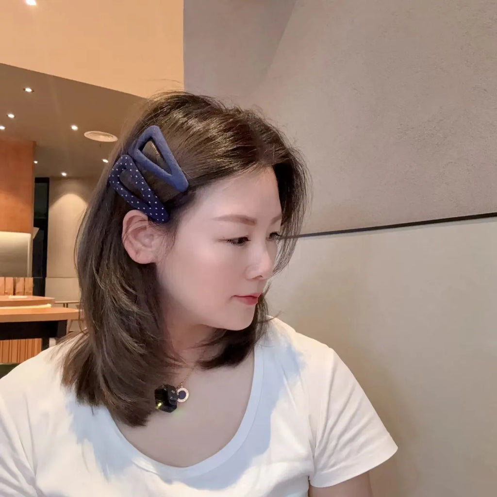 Retro dot side barrettes for women in triangle and water drop styles with dark denim and polka dot motifs.