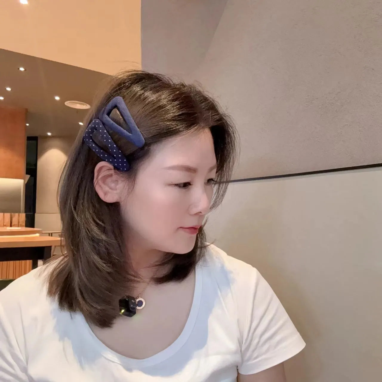Retro dot side barrettes for women in triangle and water drop styles with dark denim and polka dot motifs.