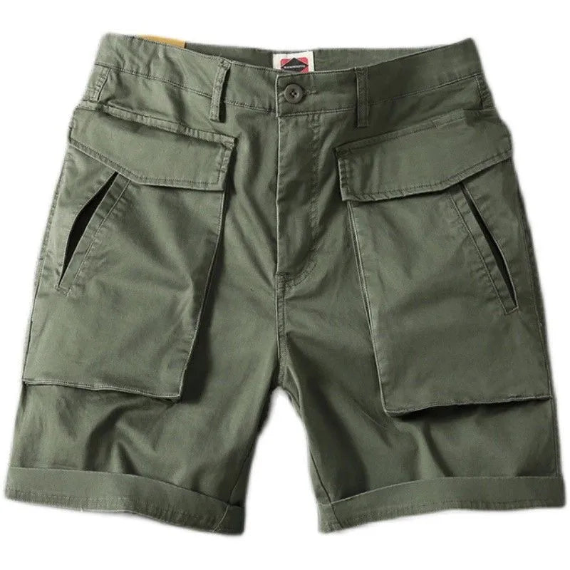 Men's straight-leg cotton cargo shorts in khaki with multiple pockets, shown for summer street style.