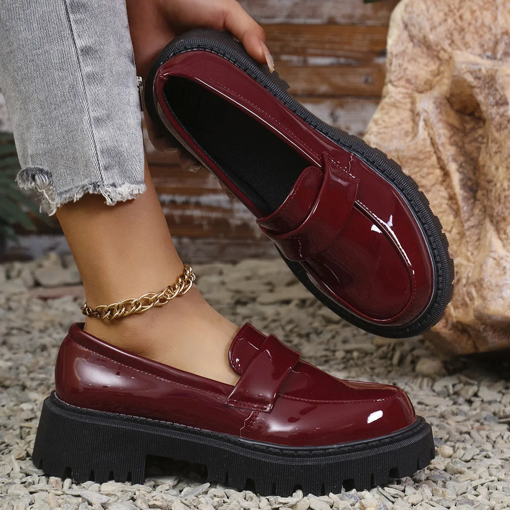 Women's chunky heel slip-on loafers in black, wine red, and green colours showing platform sole