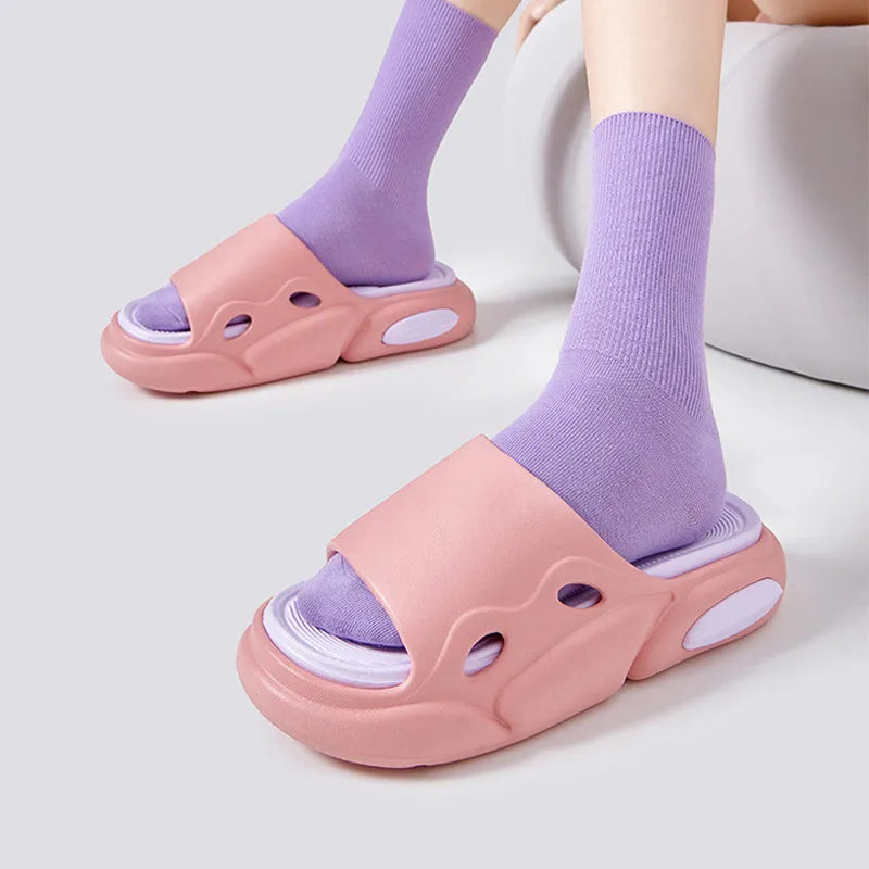 Women's two-colour EVA slippers with a thick sole and leather lining.