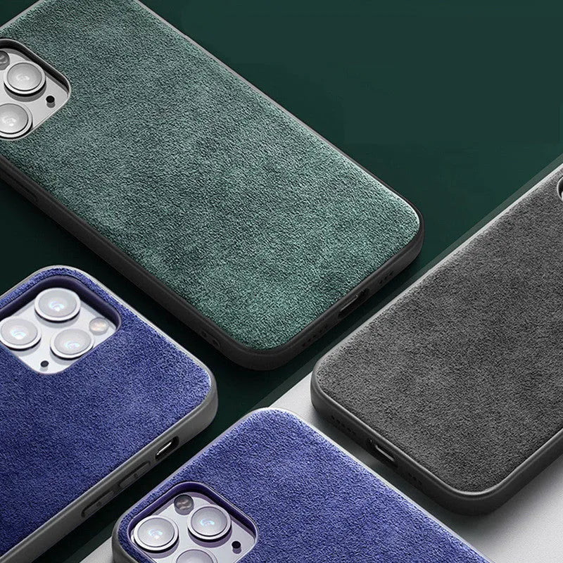 Suede mobile phone case for iPhone in elegant black, dark night green, and dark blue colours.