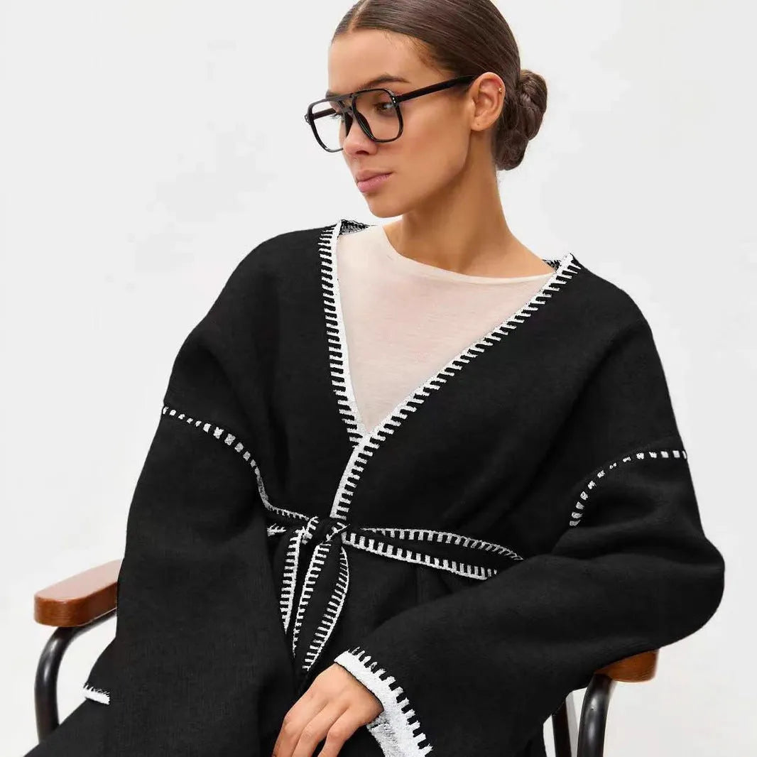 Lace-up knitted cardigan sweater in camel colour with loose fit and long sleeves