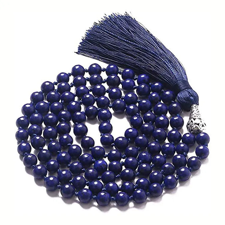 Long agate and amethyst tassel necklace with geometric beads in multiple colours on a 95-100cm chain.