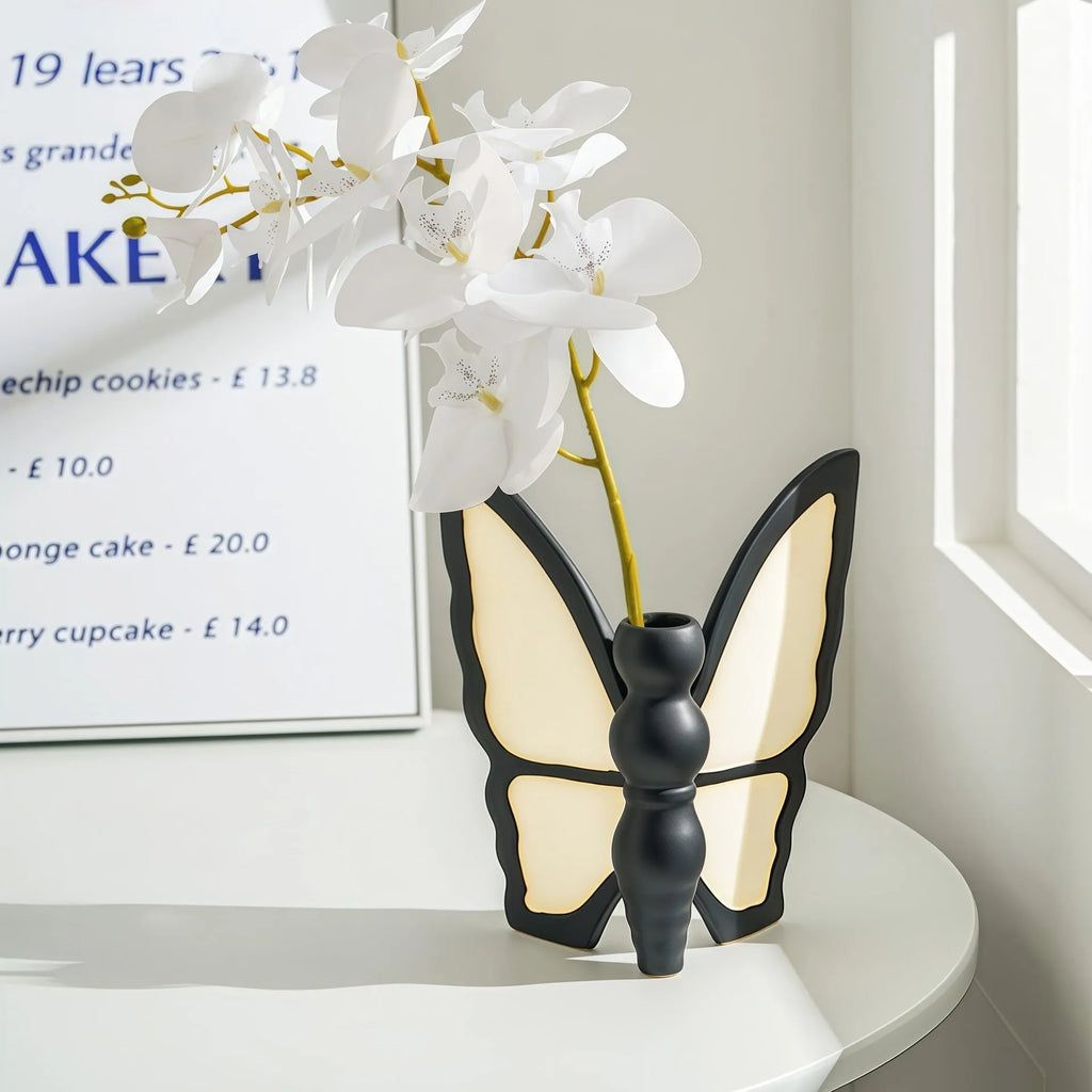 Ceramic light luxury butterfly tissue box and vase set on a living room side table