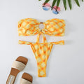 Women's floral print tube top bikini swimsuit with briefs on white background