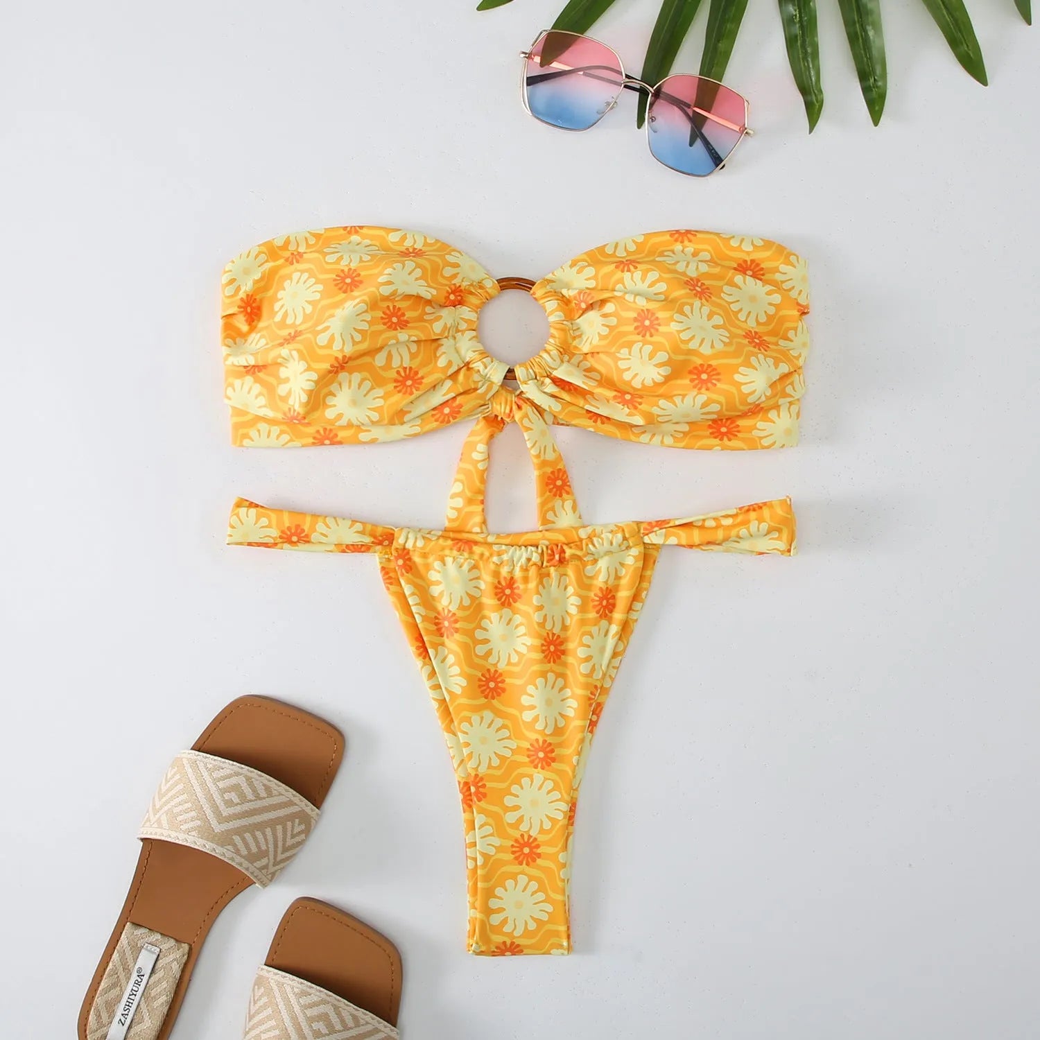 Women's floral print tube top bikini swimsuit with briefs on white background