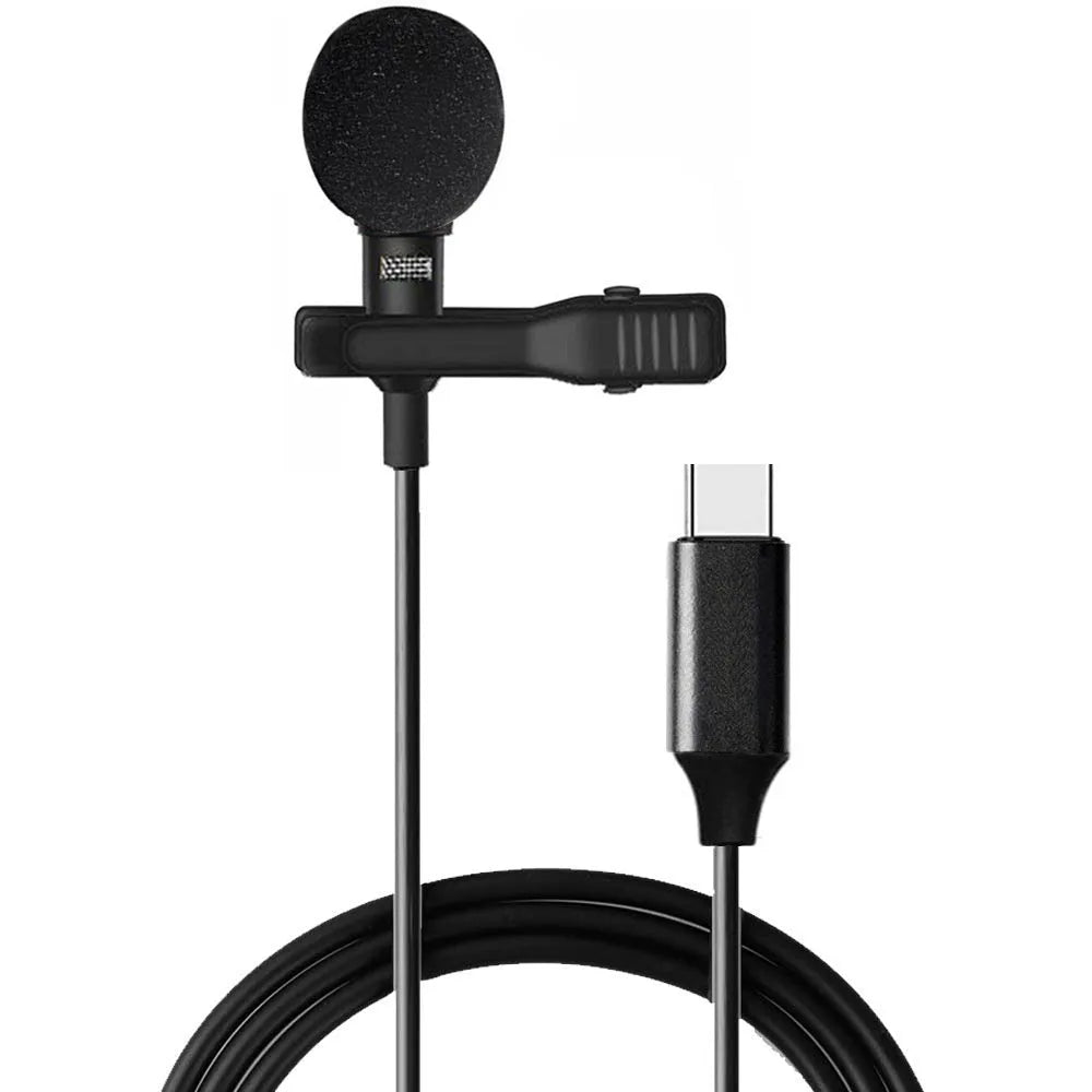 Black USB-C lavalier microphone with metal clip and sponge cover on a table