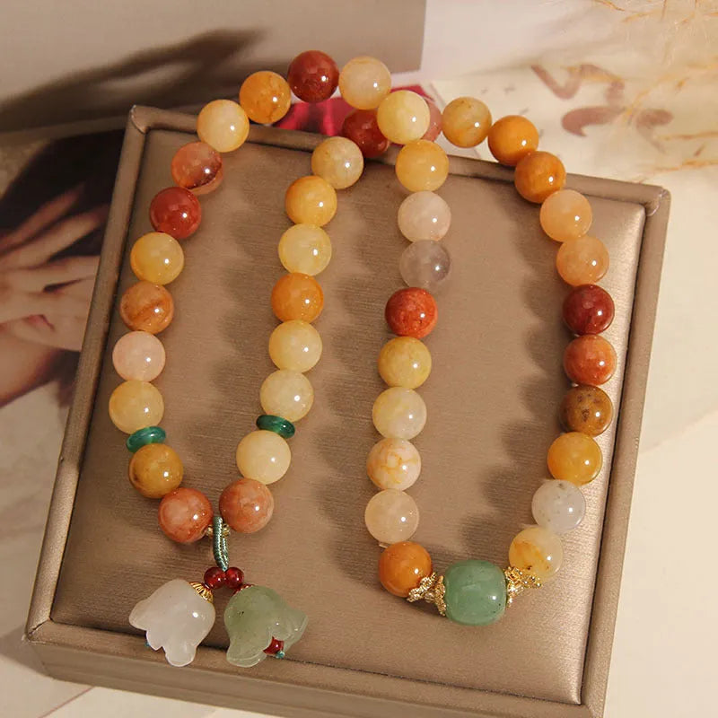 Natural jade multi-layer bracelet for women with orchid pendant on elasticated cord