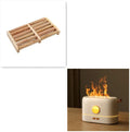 Black USB humidifier with simulated flame effect and mist output on a wooden desk