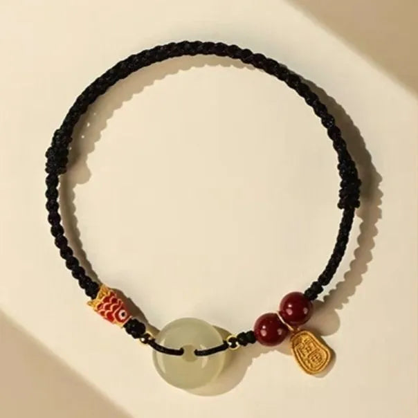 10mm Hetian jade peace buckle bracelet with colourful braided rope on wrist