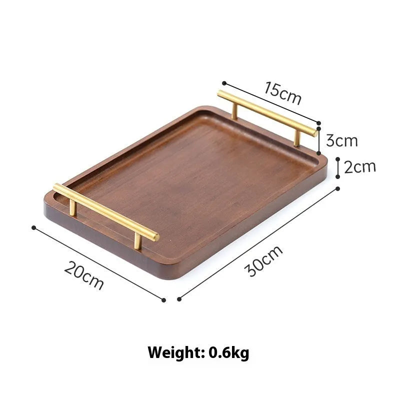 Brown-handle bamboo square serving tray on a table