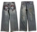 Men's grey washed-out wide-leg jeans with a straight-leg workwear design on a neutral background.