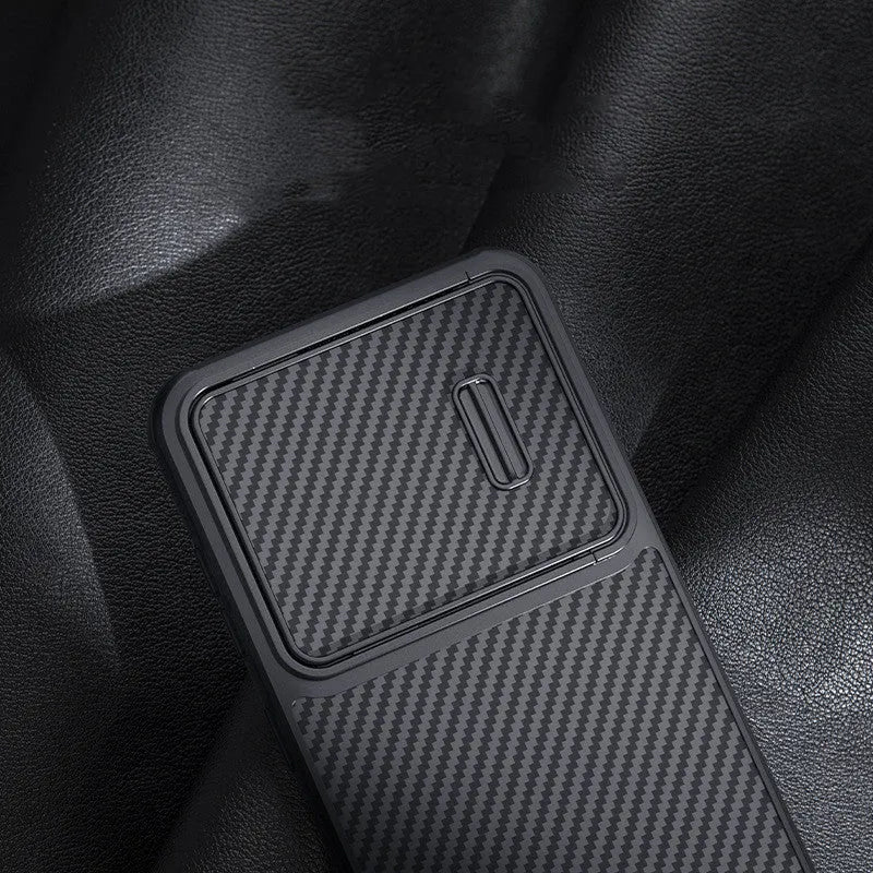 Black Samsung S23 Ultra mobile phone case with a built-in lens push cover, showing TPU and carbon fibre texture.