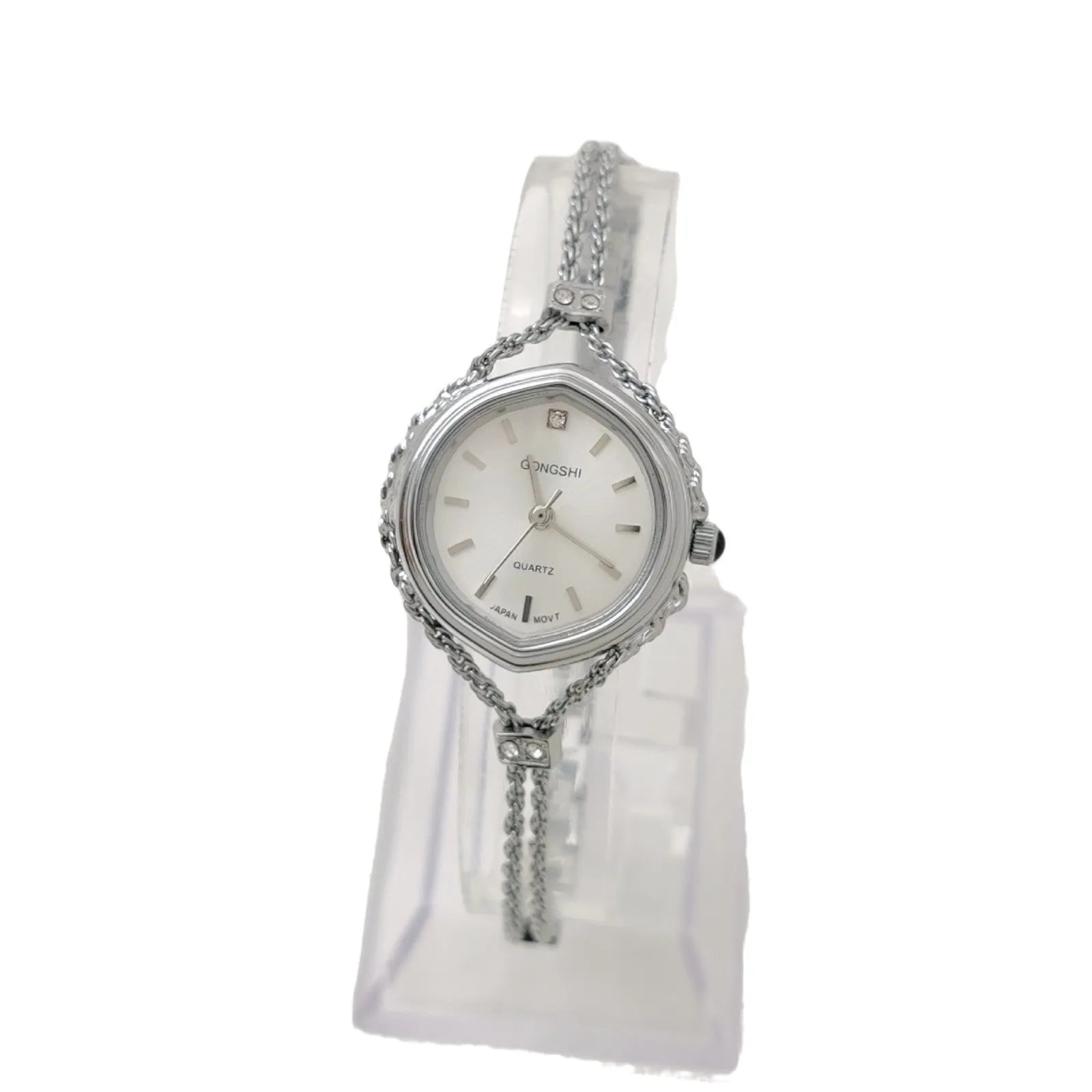 Women's quartz watch with gold copper plating, 25mm dial, mineral glass mirror, and metal chain strap on white background