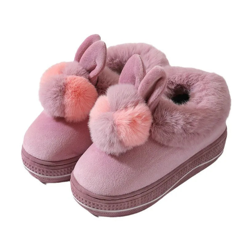 Winter high heel slippers with plush upper and thick TPR sole in gray colour on a floor