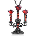 Close-up of a women's Gothic alloy necklace with a hollow candlestick pendant and cross chain links.