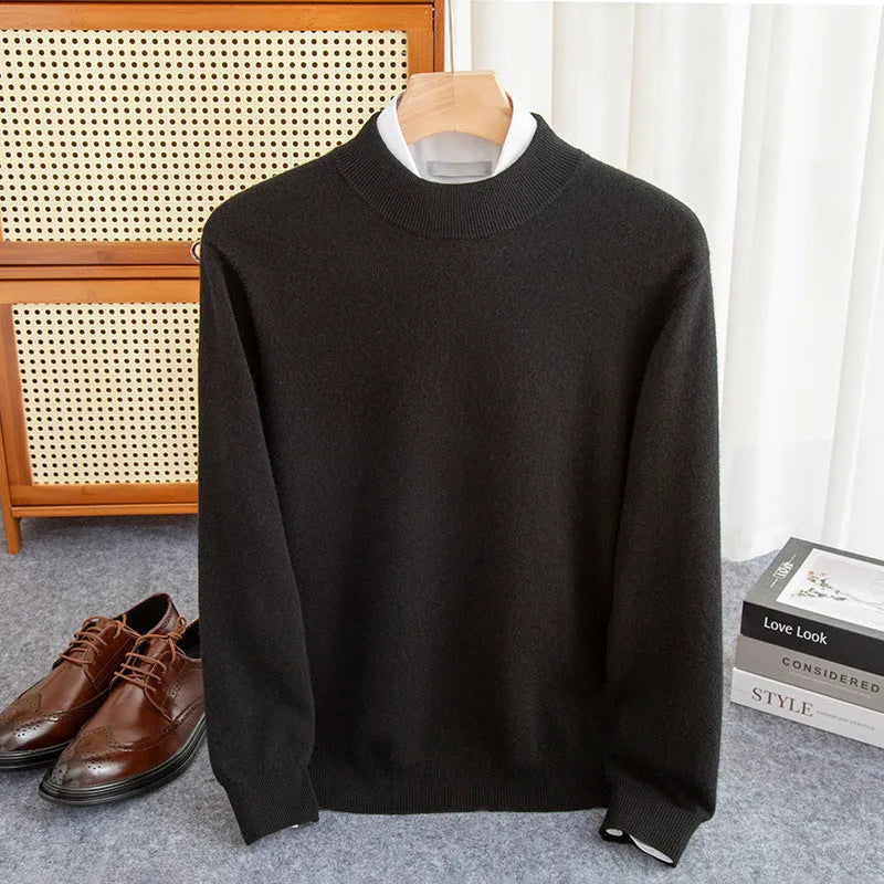 Man wearing a loose-fit half-collar wool sweater in a dark colour, showcasing the knit texture and collar style.