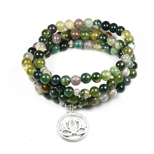 Alloy volcano white turquoise natural stone bracelet with adjustable cord on neutral background