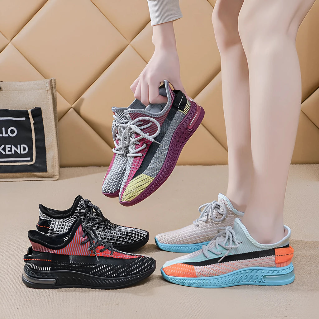 Women's lightweight breathable running shoes in purple, low-top lace-up design