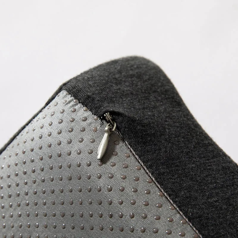 Memory foam office chair cushion in a solid colour, shown on a desk chair for scale.