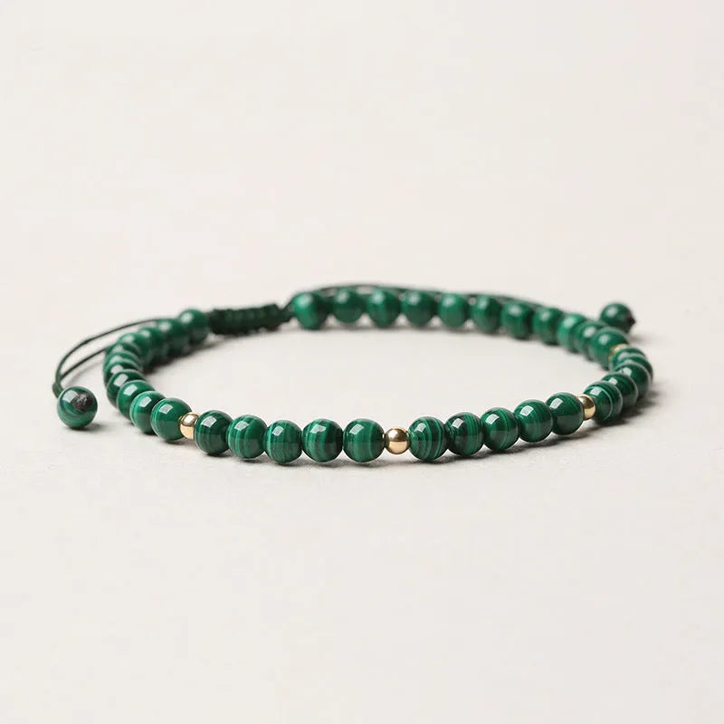 Natural malachite crystal bracelet for women with handwoven golden balls strap and textured green stone